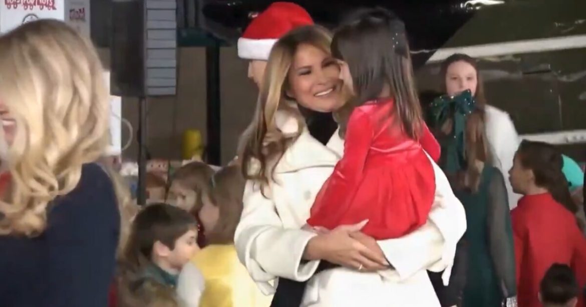 Amazing Moment First Lady Melania Trump Picks Up Child at Toys For Tots Charity Drive (VIDEO)