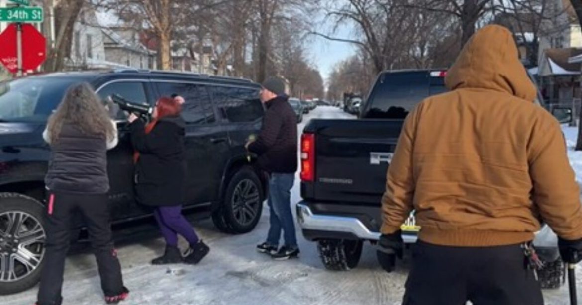 Screaming Leftist Protester Receives Instant Karma After She Unwisely Decides to Bang on Federal Agent’s Window Following ICE Self-Defense Shooting (VIDEO)